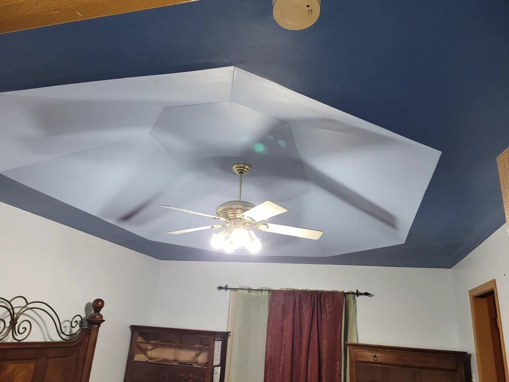Accent ceiling painted a deep charcoal tone